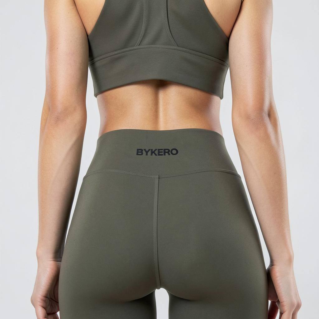 BYKERO ordmärke på plagg — Tights · Oliv